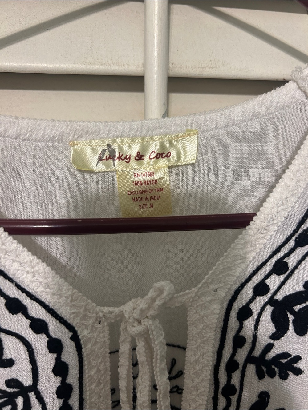 Embroidered White Tunic Top with Black Motif - Picture 2 of 6